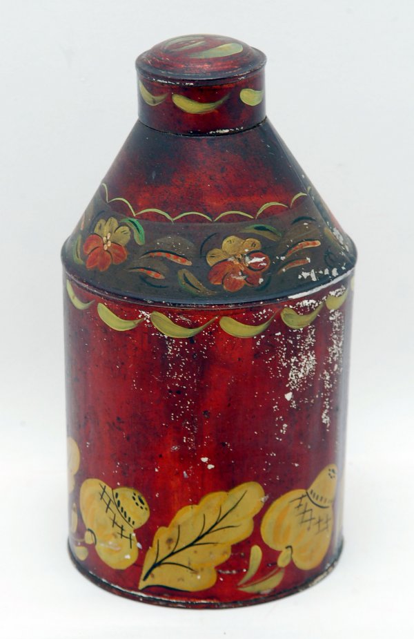 Tole Painted Tea Caddy: DESCRIPTION: Tole tin tea caddy with paint decorated exterior in mustard over brown. American, 19th century. MEASUREMENTS: 8-1/2" x 4-1/4". CONDITION: Flaking to one side.