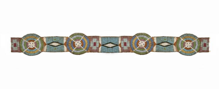 Crow Fully Beaded Blanket Strip: DESCRIPTION: Crow Indian lazy stitch beaded blanket strip circa 1880-1910. Blue beaded ground with geometric designed in white, red, yellow, pink, and green and cross rosettes. Later hand stitched bla