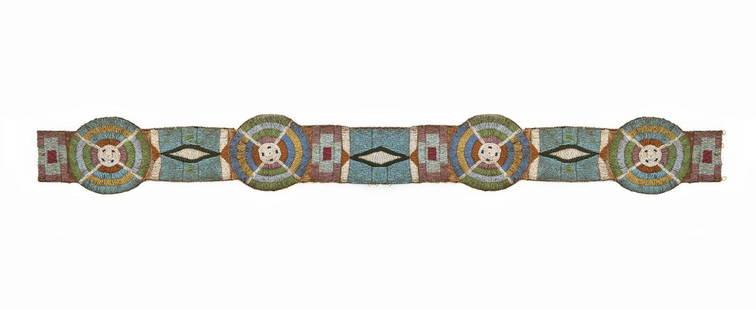 Crow Fully Beaded Blanket Strip: DESCRIPTION: Crow Indian lazy stitch beaded blanket strip circa 1880-1910. Blue beaded ground with geometric designed in white, red, yellow, pink, and green and cross rosettes. Later hand stitched bla