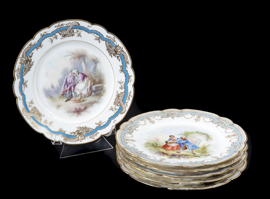6 Sevres France Porcelain Plates: DESCRIPTION: Six Sevres France porcelain plates. Each with Sevres mark to bottom, lobed rim, and romantic scene to center. Includes one Chateau de Versailles and five Chateau des Tuileries. MEASUREMEN