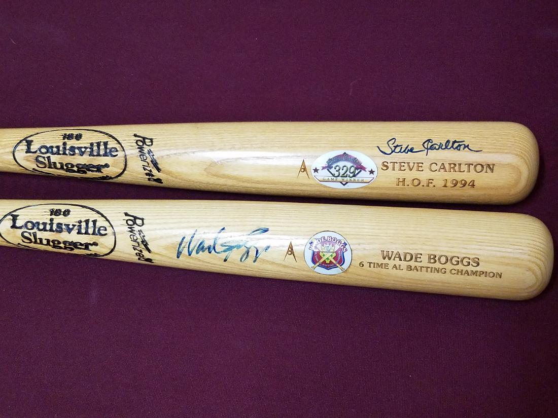 Wade Boggs and Steve Carlton Autographed Bats (1 of 3)