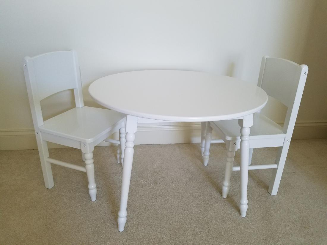 KidKraft Wooden Table and Chairs: Table 27-3/4" diameter x 19-1/2" high. Chairs 13" wide x 11-1/2" deep x 23-1/2" high. Minor scuffing to table top surface.