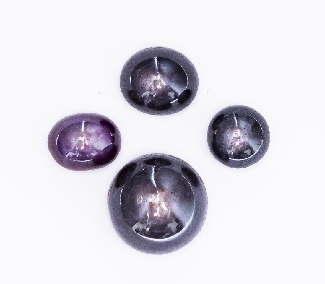 4 Purple Star Sapphire Cabochons (1 of 1)