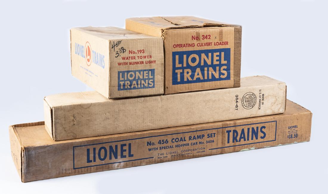 4 Lionel O Gauge Buildings & Accessories in OBs: DESCRIPTION: Four Lionel O gauge buildings and accessories in original boxes. Includes 342 operating culvert loader, 193 water tower with blinker light, 456 coal ramp set, and 364 lumber loader. CONDI
