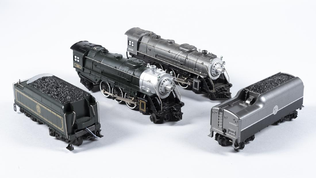 2 Lionel Locos and Tenders incl TCA: DESCRIPTION: Two Lionel engines and tenders. Includes Atlantic Coast Line 4-6-4 steam loco 8006 and tender 2671W, and Train Collector's of America steam loco and tender 5484. CONDITION: Both appear li