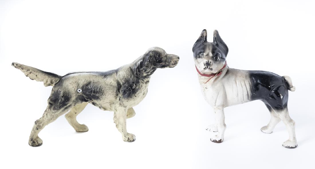 2 Cast Iron Dog Doorstops: DESCRIPTION: Two cast iron dog doorstops including Hubley Boston Terrier, and French Spaniel. MEASUREMENTS: Boston Terrier 9" x 9-1/2". Spaniel 14" x 8". CONDITION: Paint appears original. Wear to pai
