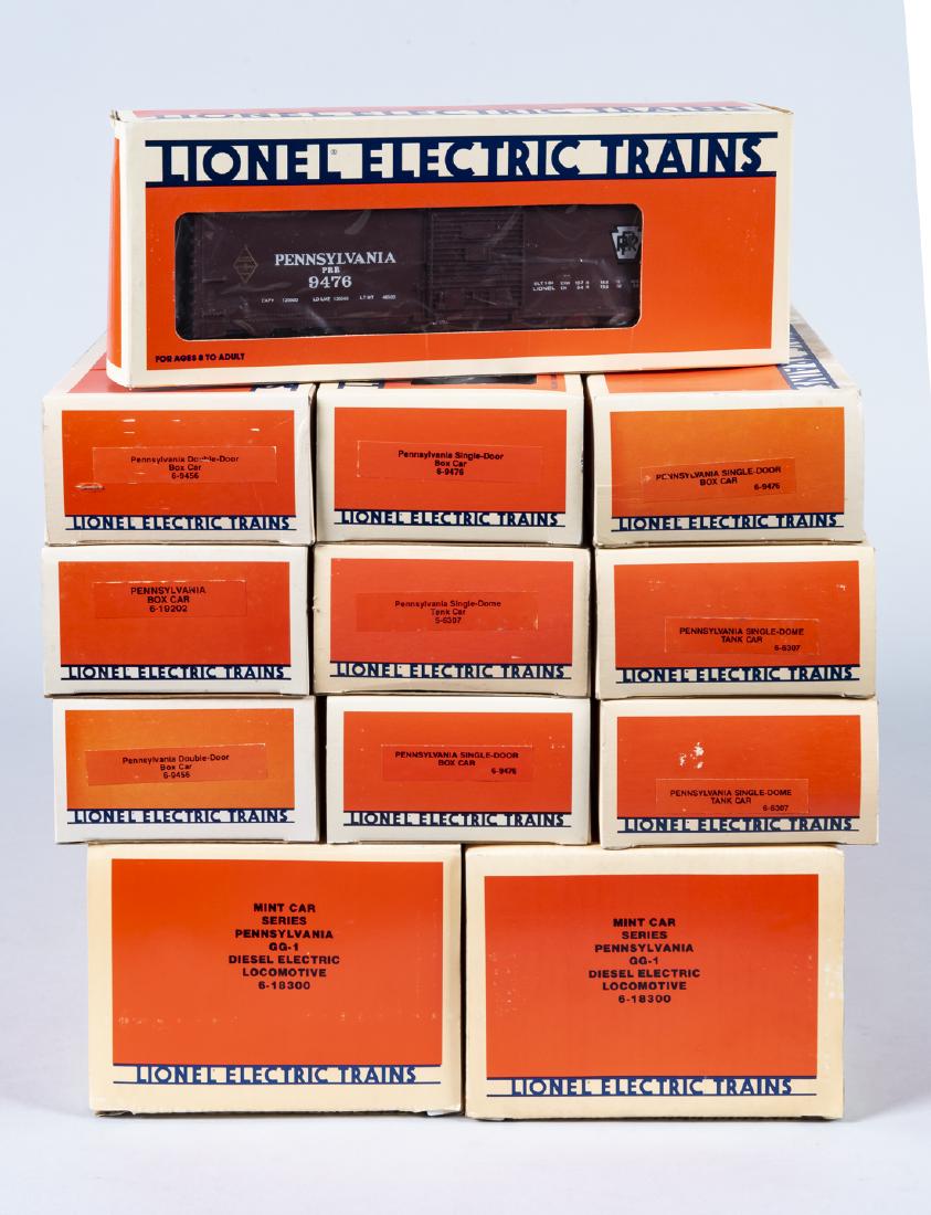 12 Lionel Pennsylvania O Gauge Incl GG-1 in OBs: DESCRIPTION: Twelve Lionel Pennsylvania O gauge rolling stock in original boxes. Includes two 18300 Mint Car Series Pennsylvania GG-1 diesel electric locomotives, four 9476, 19202, three 6307, and two