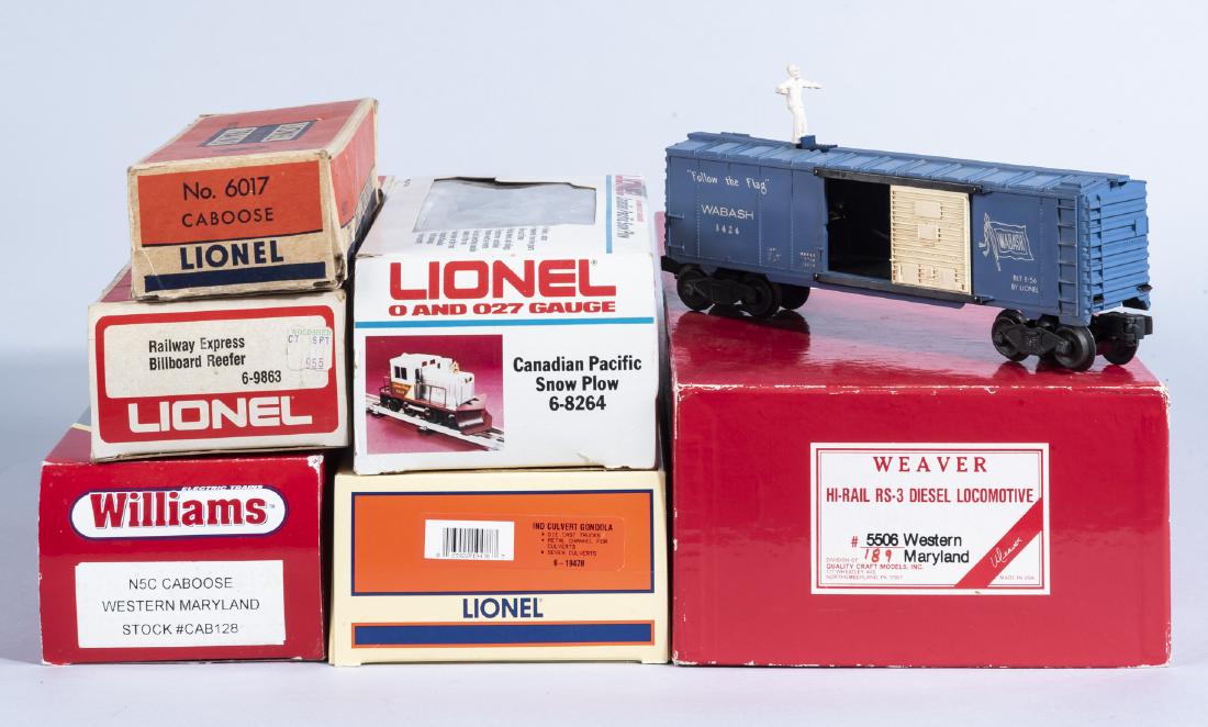 7 Assorted O Gauge Rolling Stock: DESCRIPTION: Seven assorted O gauge rolling stock cars. Most in original box. Includes Weaver HI-Rail RS-3 diesel locomotive #5506 Western Maryland, Williams #CAB128, Lionel 6-8264, Lionel 6-9863, Lio