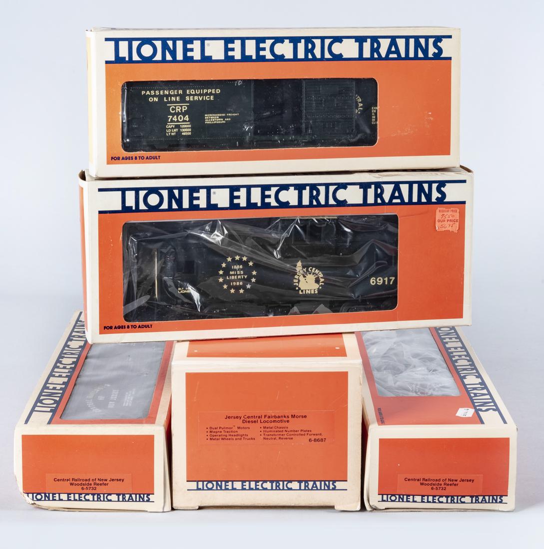 5 Lionel O/O27 Jersey Central Rolling Stock in OBs: DESCRIPTION: Five pieces Lionel O-gauge Jersey Central rolling stock in original boxes. Includes Jersey Central Fairbanks Morse diesel loco 8687, 6917, 7404, two 5732. CONDITION: Each appears unused. 