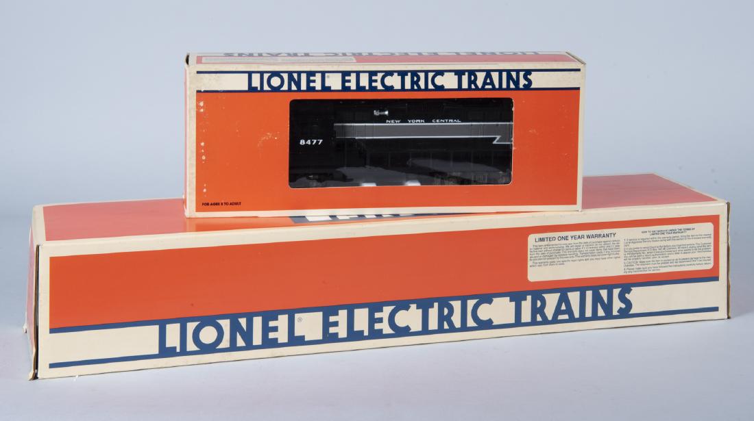 2 Lionel O/O27 New York Central Engines in OBs: DESCRIPTION: Two Lionel O/O27 New York Central engines in original boxes. Includes GP-9 diesel engine 8477, and 4-6-4 Hudson engine with tender 18002. CONDITION: Each appears unused. Boxes with shelf 