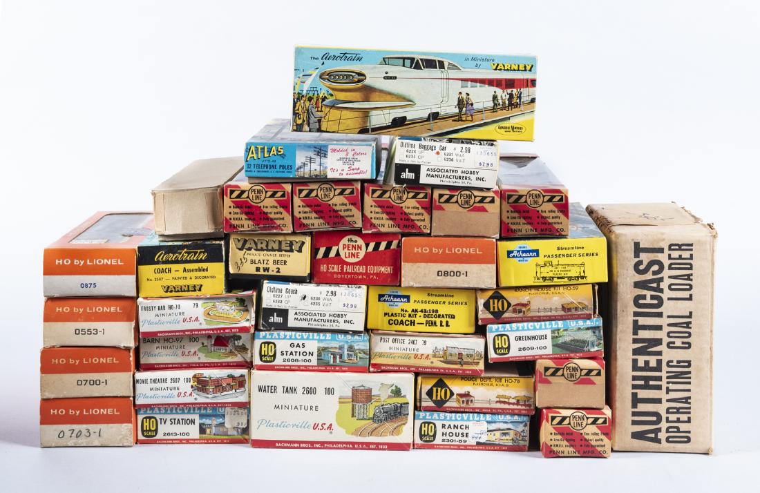 34 Pcs HO Scale Trains & Building Kits in OBs: DESCRIPTION: Thirty-four HO scale trains and building kits in original boxes. Includes: 1) Plasticville 2609, 59, 2301, 78, 2613, 2607, 70, 97, 2600, 2608, and 2407. 2) Atlas 775-49. 3) AHM 6231 and 6