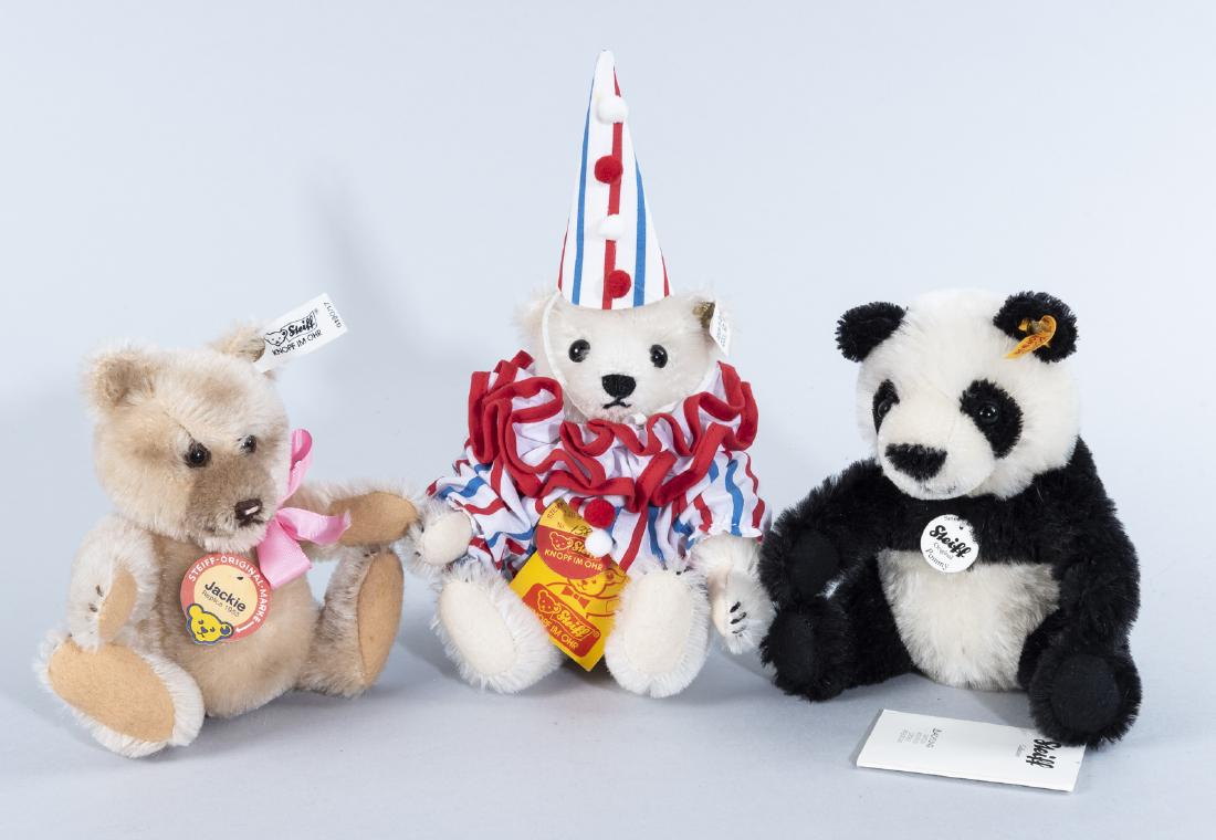 3 Steiff Bears: DESCRIPTION: Three Steiff mohair bears. Each with ear buttons. Includes: 1) Circus Clown Teddy No. 1384. 5-1/2" high. 2) Pummy Panda. 6" high. 3) Jackie Replica 1953. 5-1/2" high. MEASUREMENTS: See de