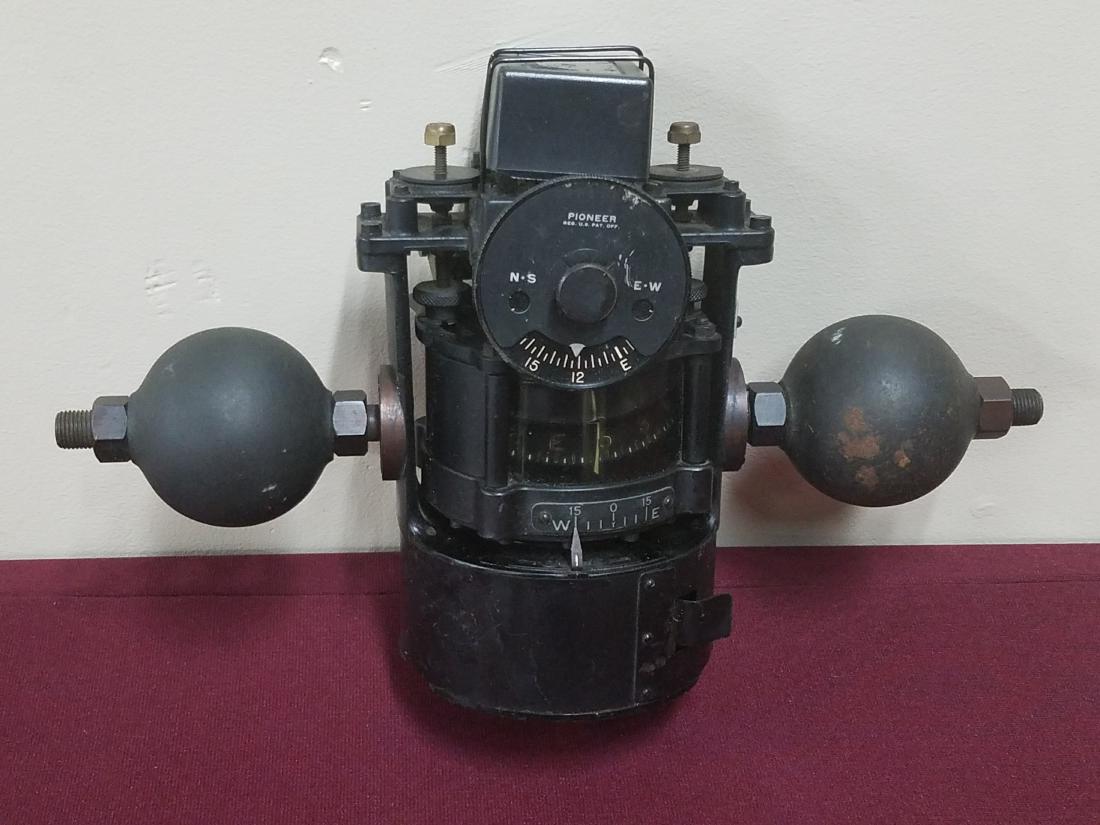 Pioneer Ships Compass: 9" high x 12-1/2" wide. Minor rusting throughout.