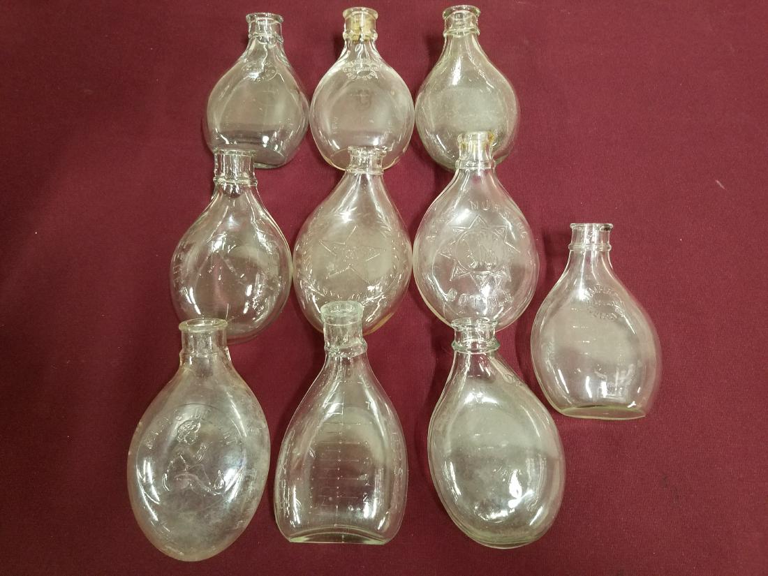 10 Nursing Bottles: Includes Acme, Babys Delight, and Empire Nurser.