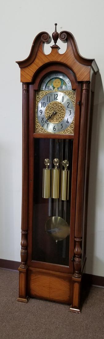 General Electric Grandfather Clock: Electrified clock. 79" high. Model "Adam's. In working order.