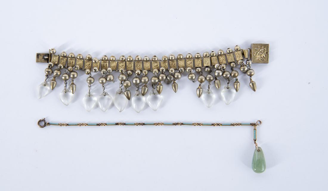 2 Bracelets: One with enamel and jade drop. Other with glass beads, clasp marked China. 6-1/2" length.