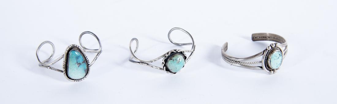 3 Silver and Turquoise Cuff Bracelets: One marked "MA". Tops 1" to 1-3/4". Interiors 2-1/8" to 2-1/4".