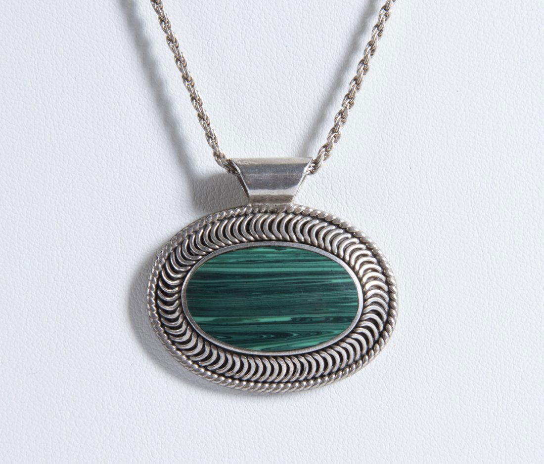 Malachite and Sterling Necklace: Marked "Mexico 925". Pendant 1-1/2" x 1-1/4". Chain 22".