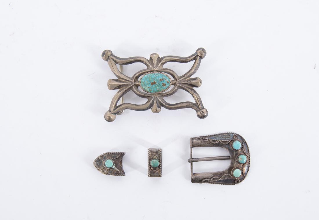 2 Silver Buckles: One three-part incl buckle, loop and belt tip. Buckles 1-3/4" x 1-1/2" and 3" x 2-1/8".