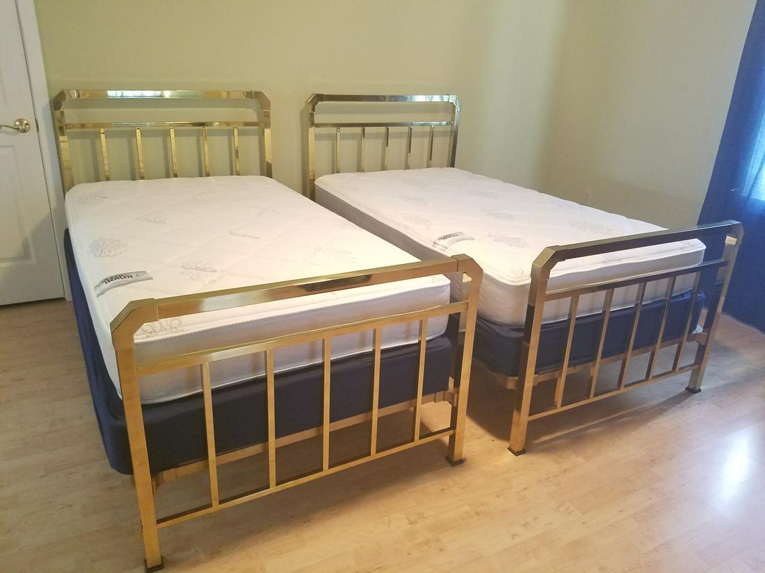 2 Brass Beds: Mattress and box springs included. Both 42-1/2" wide x 80" deep x 44" high.