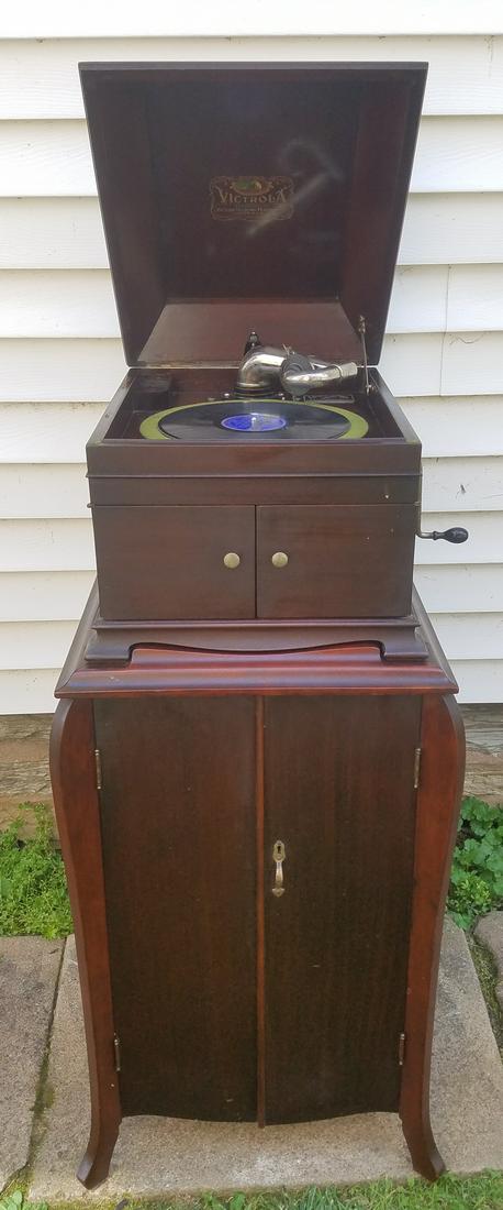 Victrola: 21" wide X 23" deep X 49" high. In working order.