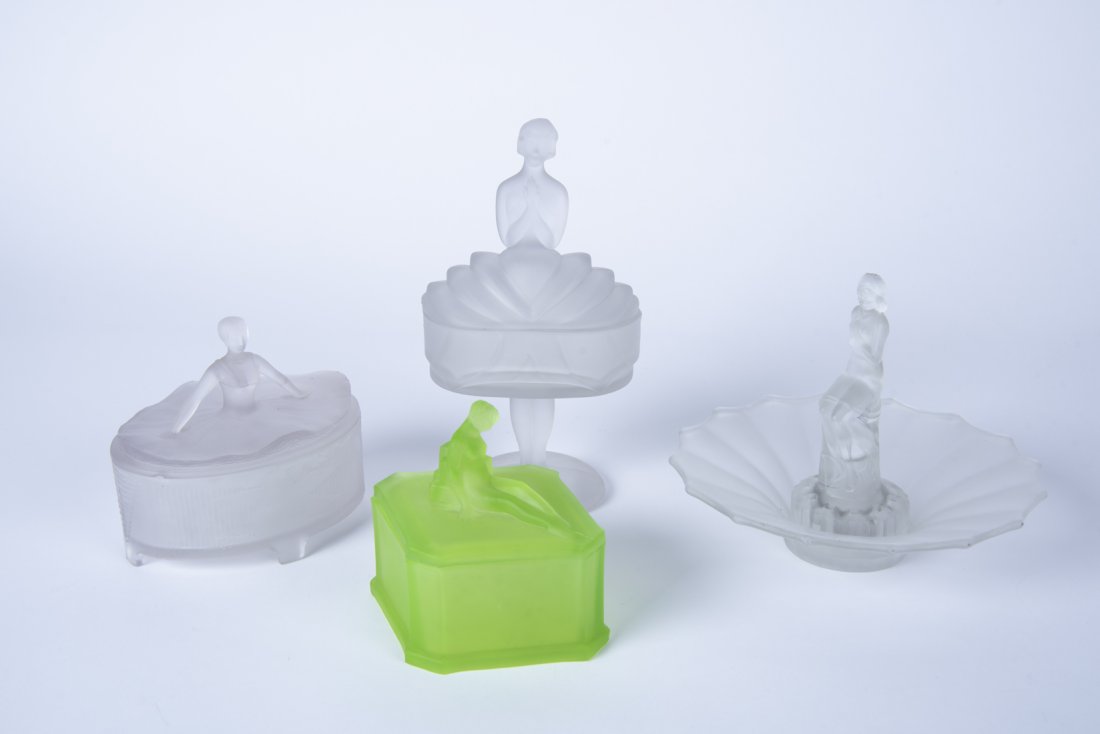4 Art Deco Frosted Glass Dresser Items: DESCRIPTION: Four Art Deco frosted glass dresser items. Includes: 1) Flower bowl with figural frog. 8" diameter x 7" high. 2) Dresser box with figural ballerina lid. 6" wide x 5-1/2" high. Chip to lid