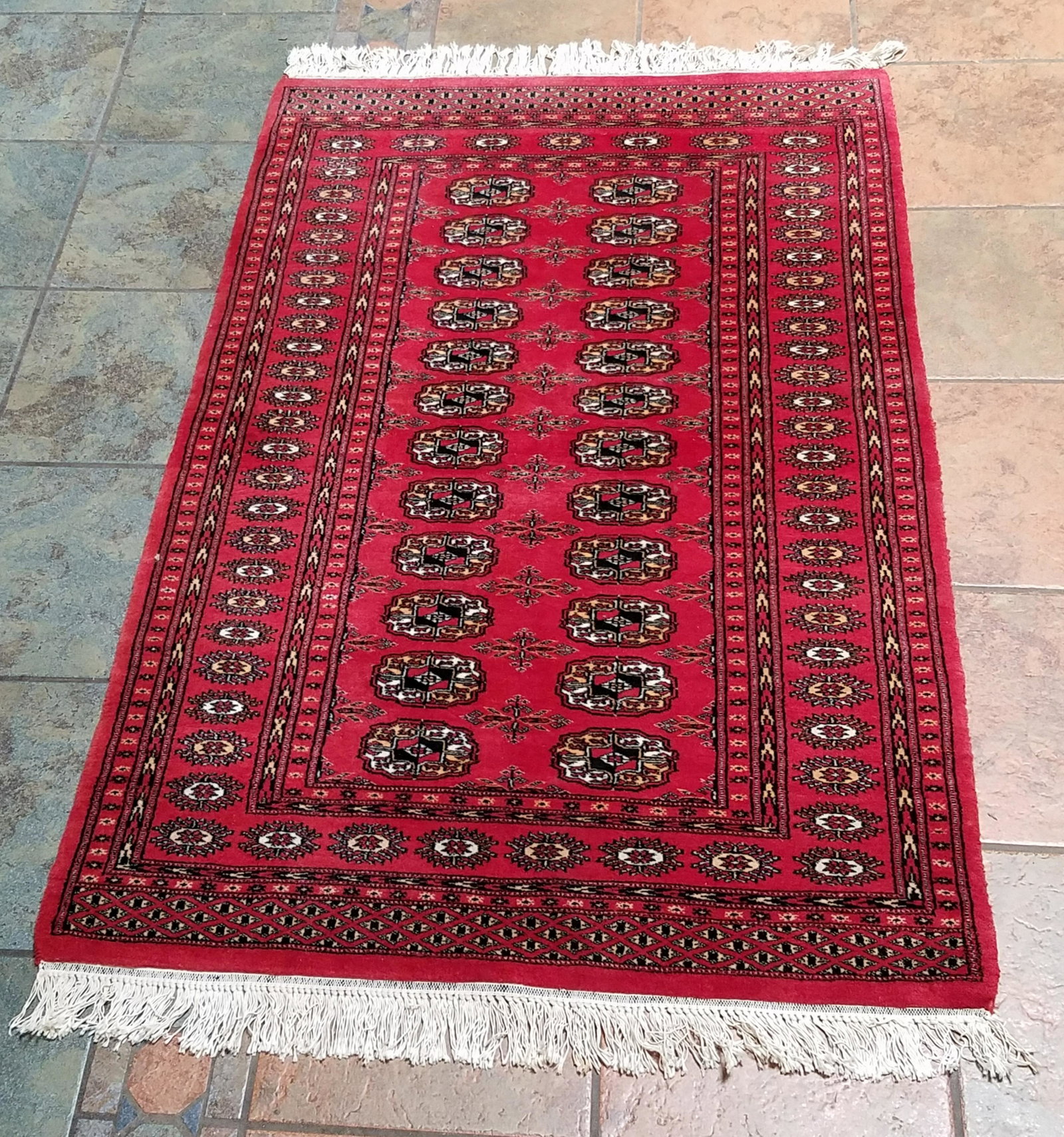Area Rug: 4'11" long x 3'2" wide.