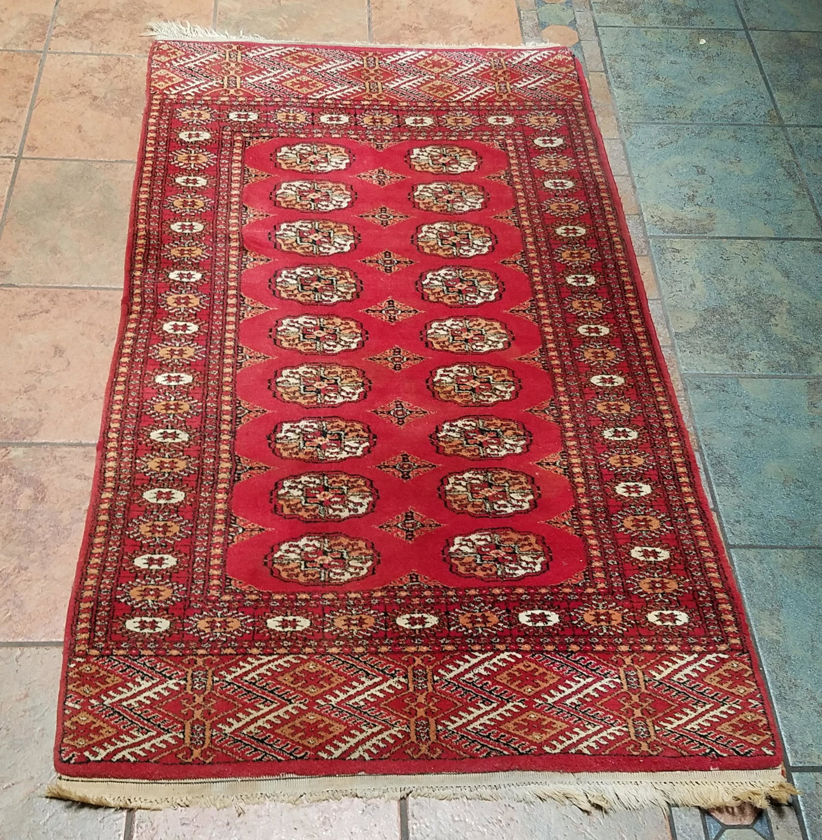 Area Rug: 5'2" long x 3'1" wide. Some fringe loss.