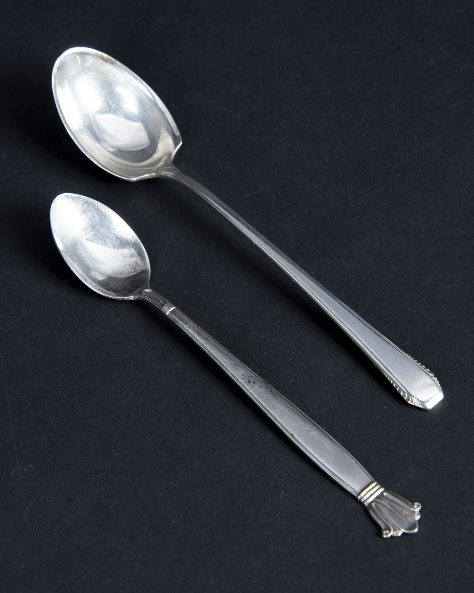 2 Sterling Spoons: DESCRIPTION: Two sterling spoons. Includes: 1) Towle spoon in the Cascade pattern. Marked "Towle Sterling Pat 1935 Cascade". 2) Weidlich Sterling Spoon Co. infant feeding spoon in the Jenny Lind patte