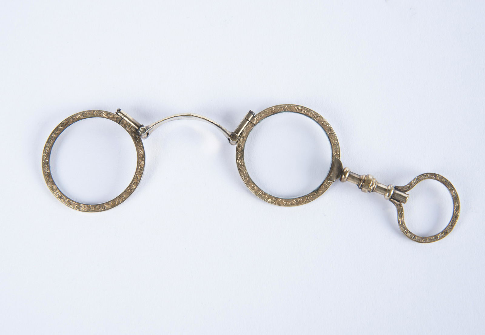 Pair 19th Century Gold Filled Lorgnette: DESCRIPTION: Pair 19th century gold filled lorgnette. MEASUREMENTS: Open 5-1/4" long. Closed 3" long. CONDITION: Light wear.