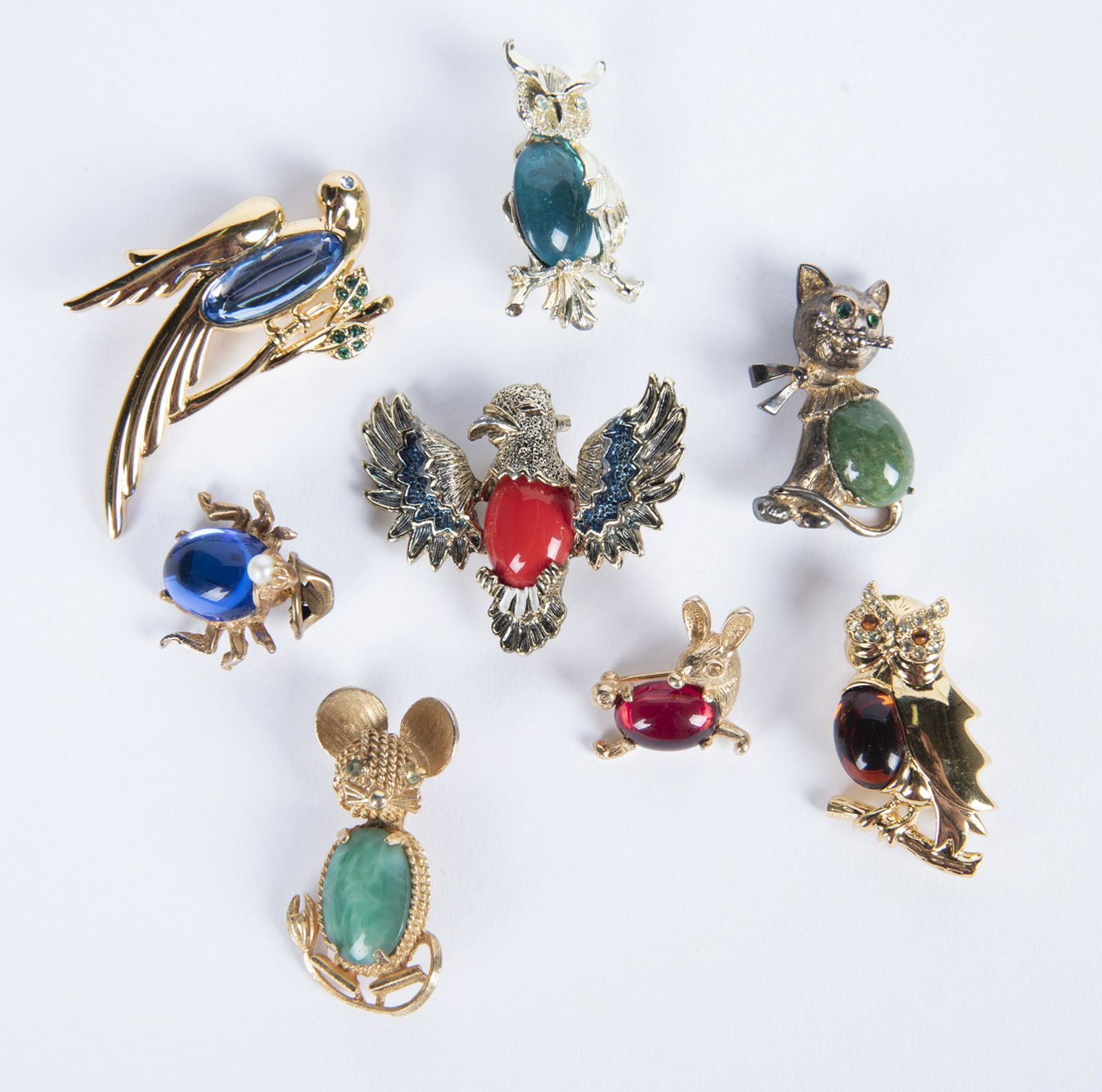 8 Signed Jelly Bellies: DESCRIPTION: Eight signed jelly bellies including Monet owl and bird, Creed cat, Castelcliff rabbit, Gerry's eagle and owl, Art mouse, and AJC beetle. MEASUREMENTS: Various. Ranges from 1" to 1-1/2".