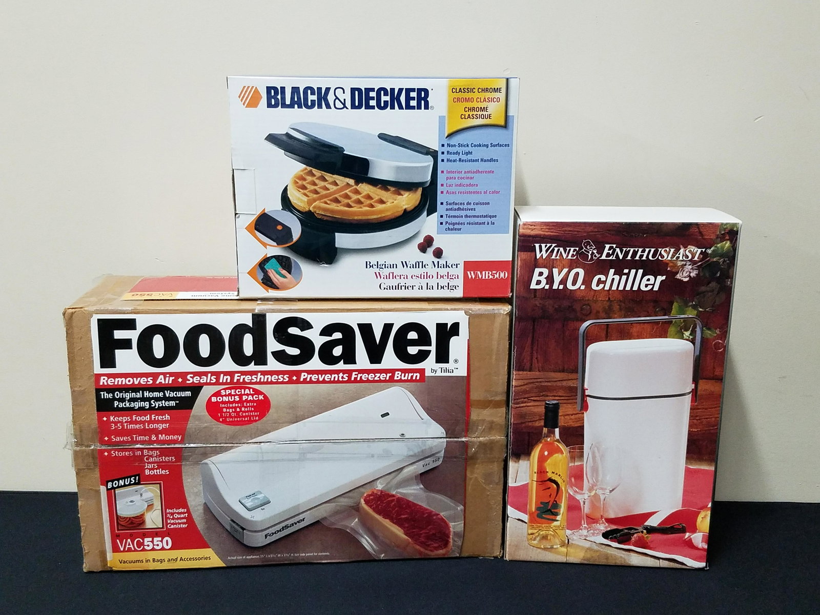 3 Kitchen Items: Includes food saver, waffle maker and wine chiller.