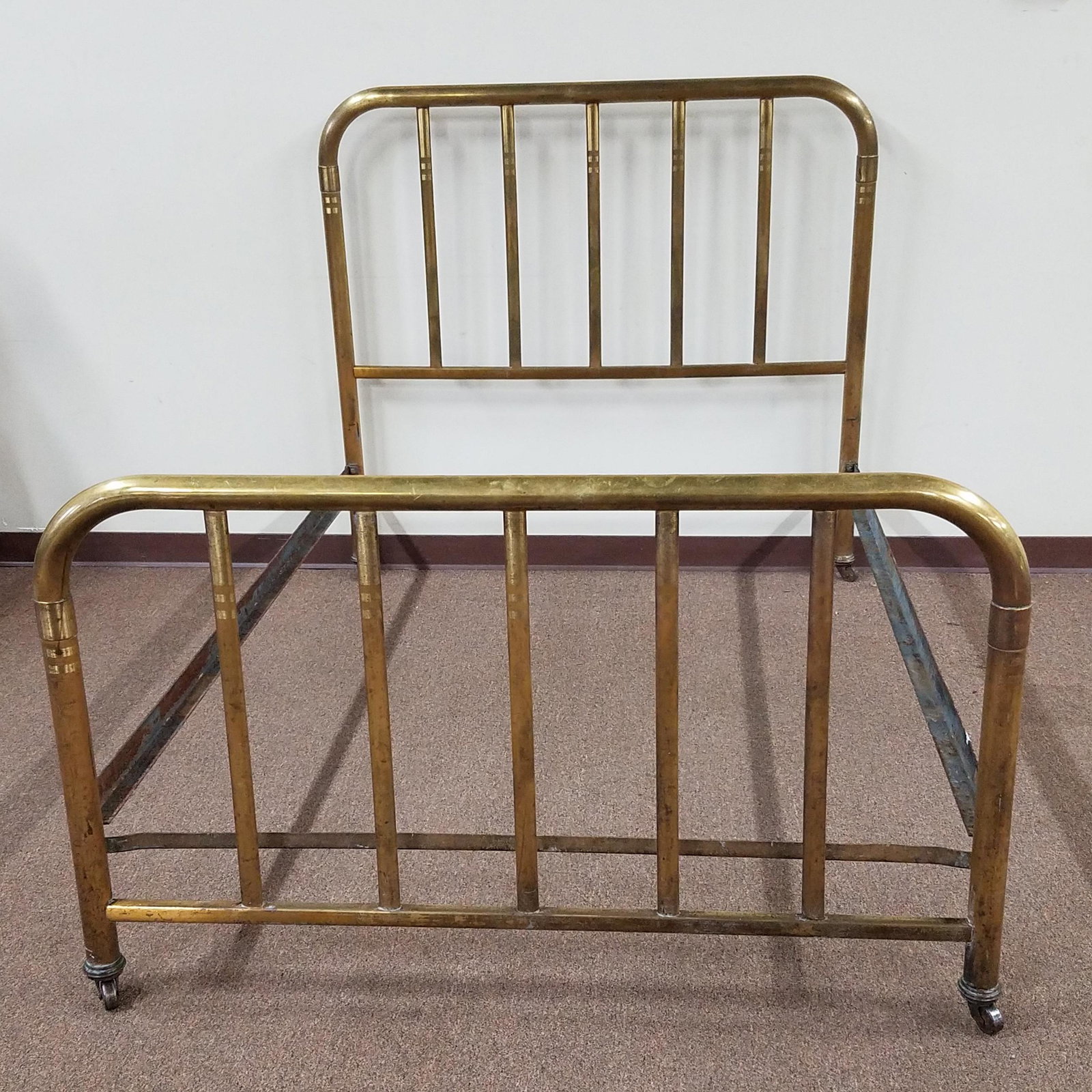 Antique Brass Bed: 54" wide x 80" deep x 49-1/2" high.