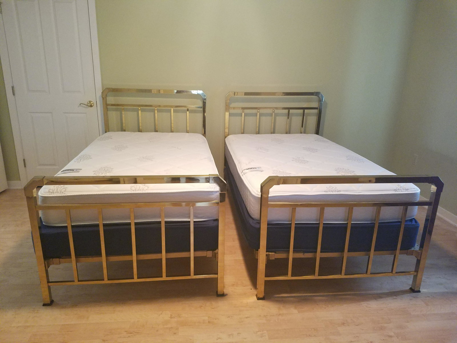 2 Brass Beds: Mattress and box springs included. Both 42-1/2" wide x 80" deep x 44" high.
