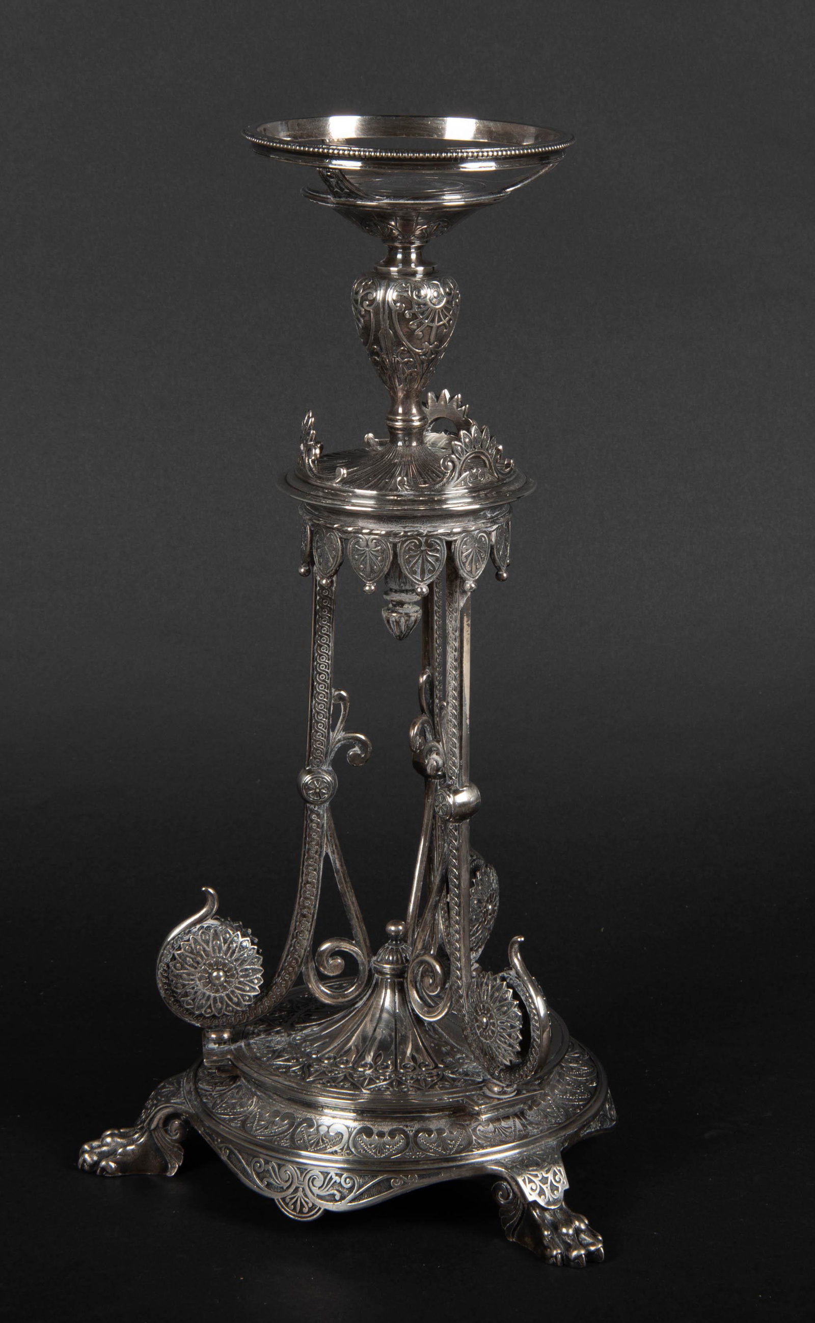 Elkington Silverplate Centerpiece: Circa 1840-1897. Marked with Elkington hallmark. MEASUREMENTS: 8-1/4" base diameter x 16" high.