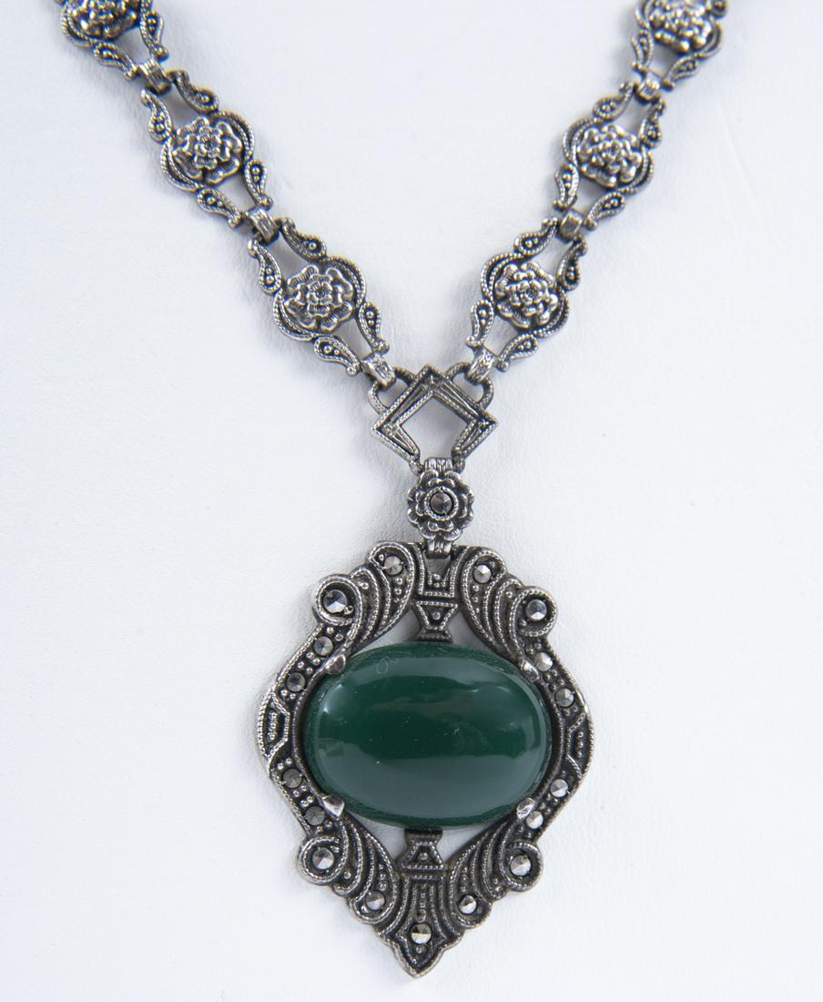 Vintage Sterling and Marcasite Necklace: DESCRIPTION: Vintage sterling and marcasite necklace. Marked sterling. MEASUREMENTS: 9-1/2" long. CONDITION: Light wear. No missing stones.