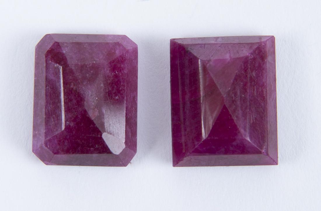 Two Pcs 11.5 Carat Natural Pink Beryl Gemstones: DESCRIPTION: Two pieces emerald shaped natural pink beryl. MEASUREMENTS: 11.5 carat. 16.18 x 12.58 x 6.23 mm. CONDITION: Good. Includes gemstone brief report.