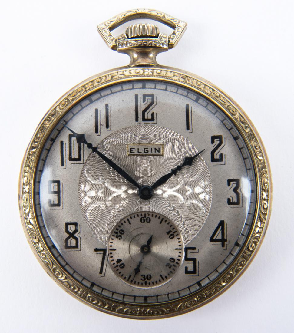 Elgin 17 Jewel Pocket Watch: DESCRIPTION: Elgin 17 jewel pocket watch. Marked "25 year B&B Favorite 11206596". MEASUREMENTS: 1-3/4" face diameter. CONDITION: Running.