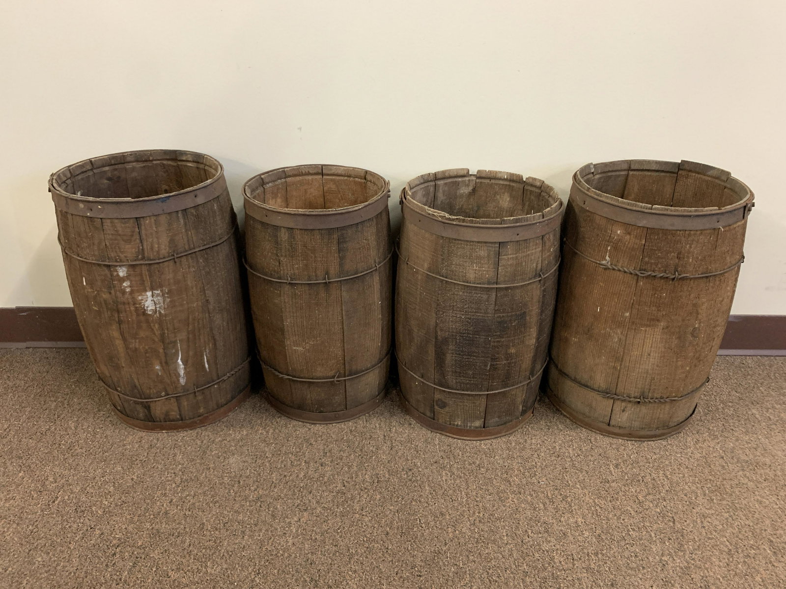 4 Nail Kegs: 10" to 11" diameter x 17" to 18" high. Property from Rossmoyne Farm Mechanicsburg, PA.