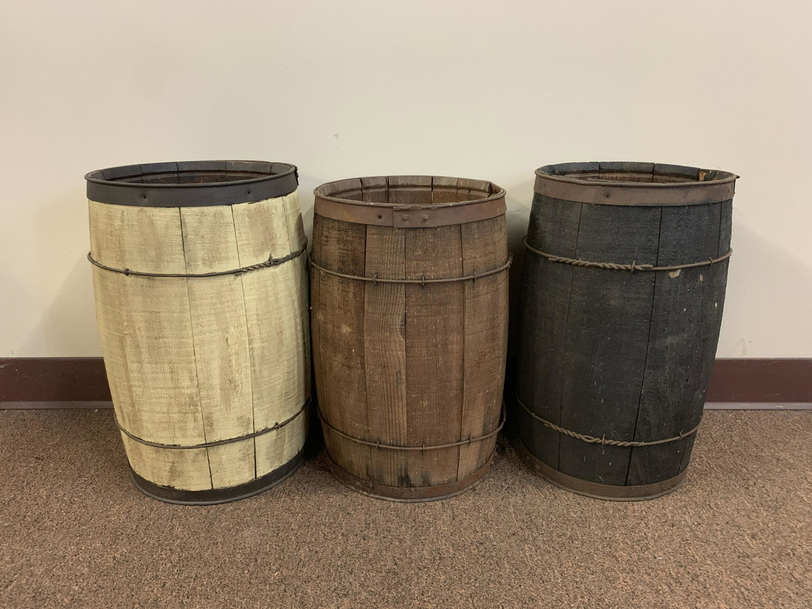 3 Nail Kegs: 2 Painted nail kegs included. 10-1/4" to 11" diameter x 17" to 18" high. Property from Rossmoyne Farm Mechanicsburg, PA.