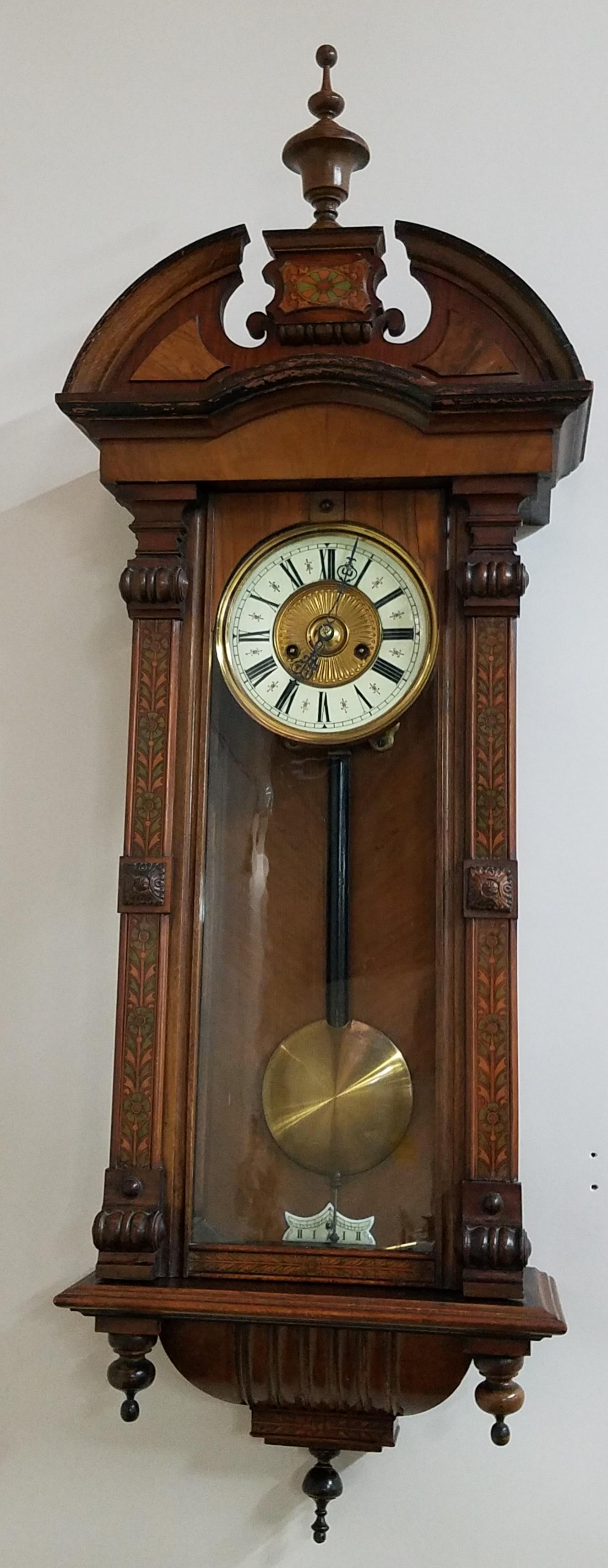 Inlayed Wall Clock: In working order. 16-1/2" wide x 7-1/4" deep x 45" high.