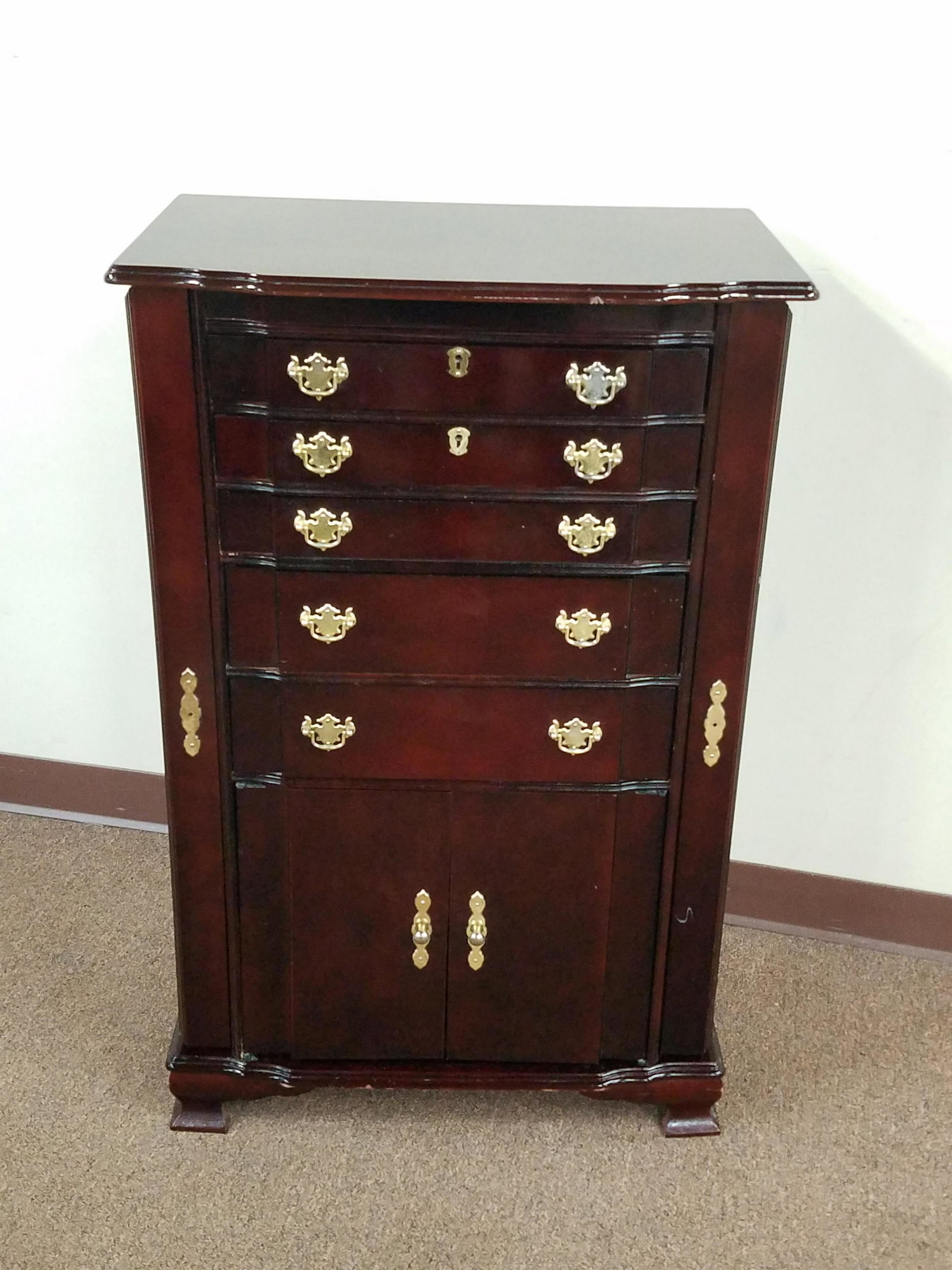Powell Jewelry Chest: 25" wide x 15-1/4" deep x 39" high.