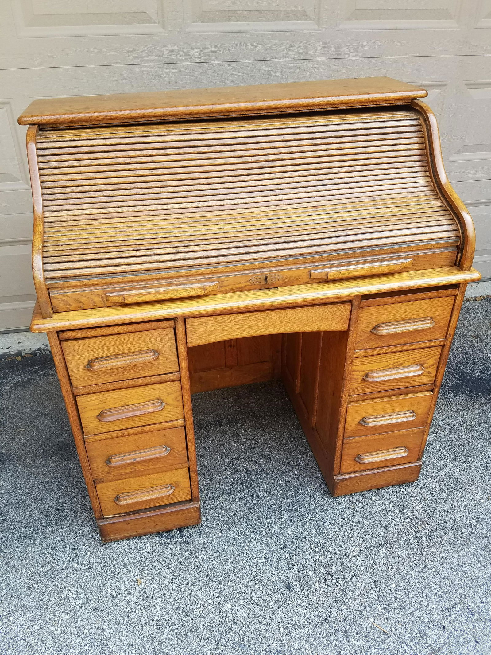 Roll Top Desk: 41 3/4" wide X 26" deep X 43 1/2" high. Roll top repaired.