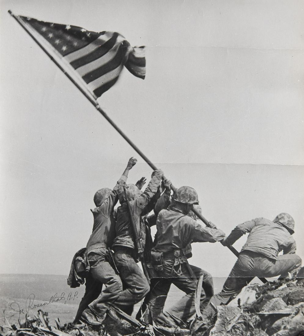 Raising the Flag on Iwo Jima Photograph: DESCRIPTION: Raising of the Flag on Iwo Jima enlarged photograph. Printed signature "Joe Rosenthal, A.P" lower left. MEASUREMENTS: 23-1/2" x 20". CONDITION: Previously rolled. Light wear along edges a