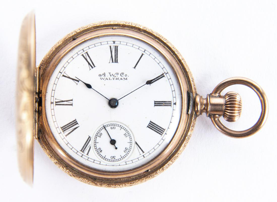 Waltham Hunter Case Pocket Watch: DESCRIPTION: Waltham hunter case pocket watch. Case marked "Waltham 233906", and inscribed "Floyd from Mother". 10k gold filled case. MEASUREMENTS: 1-1/4" face diameter. CONDITION: Running. Light wear