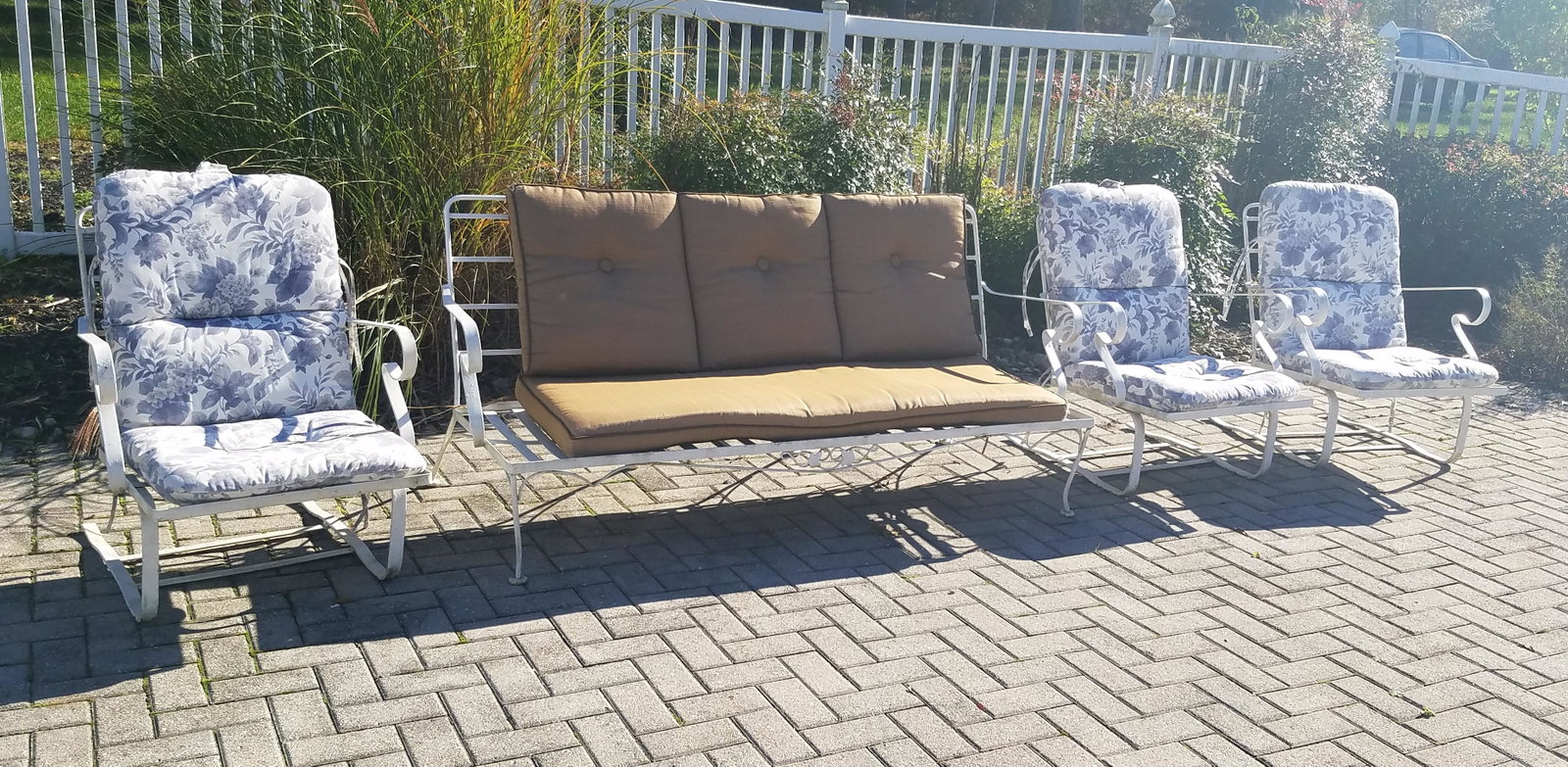 Metal Outdoor Sofa and 3 Chairs: Sofa: 70-1/4" wide x 30-3/4" high x 32-1/2" high. Chairs: 25-1/2" wide x 33" deep x 33" high. Some rusting.