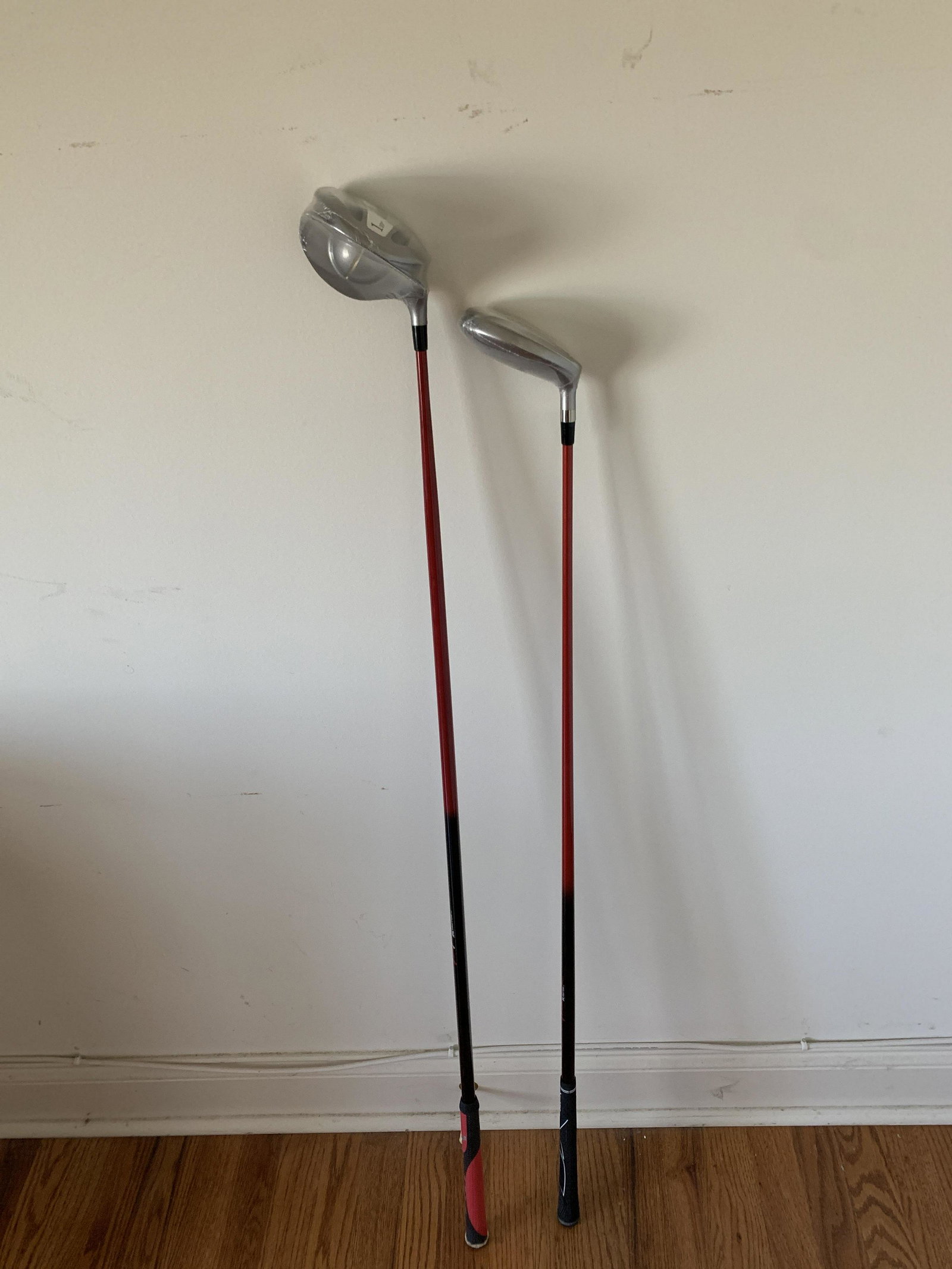2 X Factor Hammer Golf Clubs: 10° Driver: 47 high. 20° 3 Hybrid: 43-1/2 high.