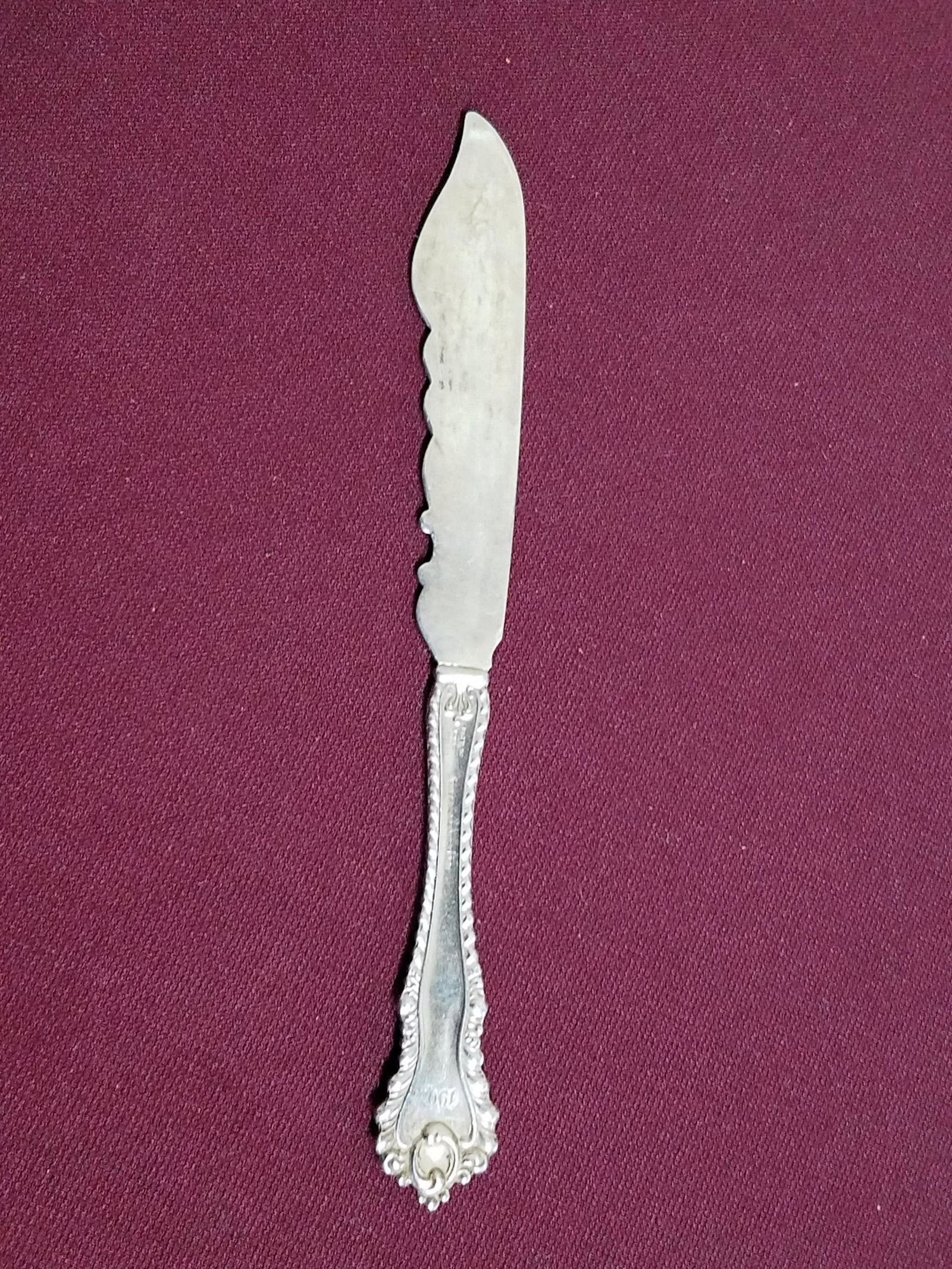 Theodore B. Starr Sterling Handle Butter Knife: Engraved "1903". 7-3/4" long. 1.74 ozt total weight.