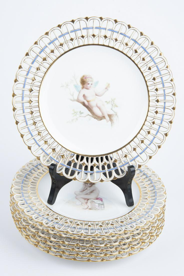 7 19th C Mintons Cabinet Plates Attrib Boullemier: DESCRIPTION: Seven 19th century Mintons reticulated cabinet plates with hand painted nude and cherub portraits attributed to Antonin Boullemier. Each plate is individually marked on bottom C380, C394