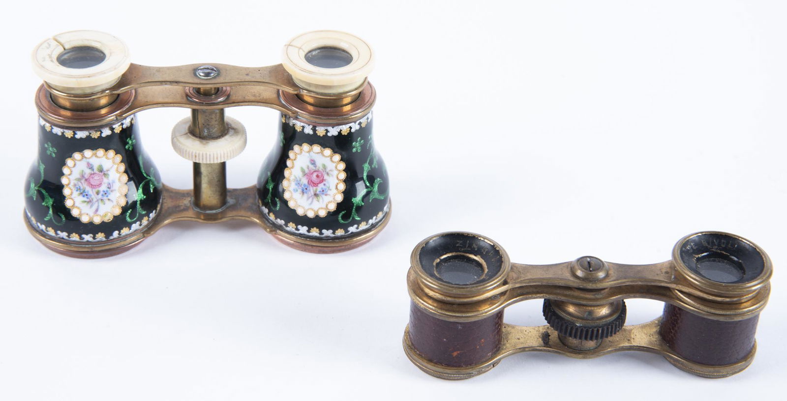 2 19th C. Opera Glasses Incl Enamel & Bone: DESCRIPTION: Two pairs of opera glasses. 19th century. Includes: 1) Zingraff Paris brass binoculars with red leather accent. Eye rings marked "ZINGRAFF PARIS". 3-1/2" x 1" x 1-1/". 2) Brass and green